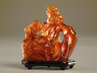 Small Amber Carving of a Boy, a Water Buffalo and Tree