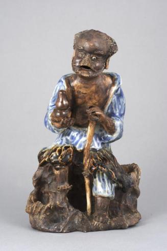 Shiwan Ware Li Tie-quei Seated on a Rock