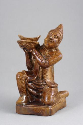 Shiwan Ware - Kneeling Foreigner with Ingot