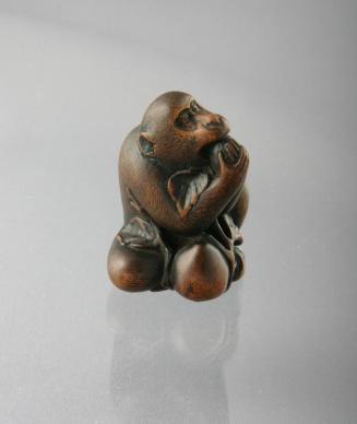 Netsuke: Monkey Eating a Persimmon