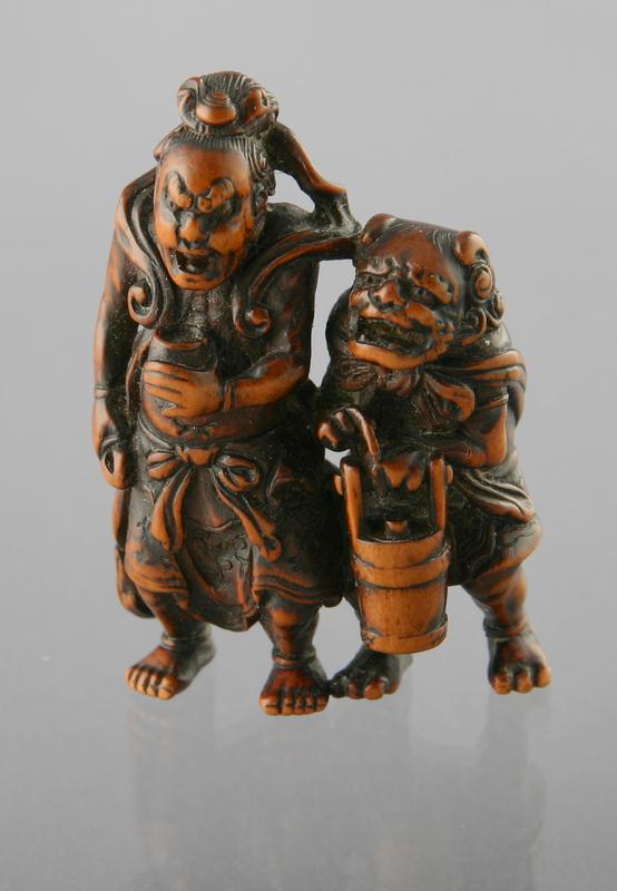 Netsuke: A Nio and Raijin the Thunder God sharing a Cup of Sake