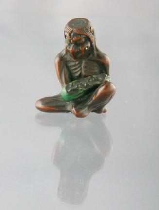 Netsuke of Kappa Holding a Cucumber