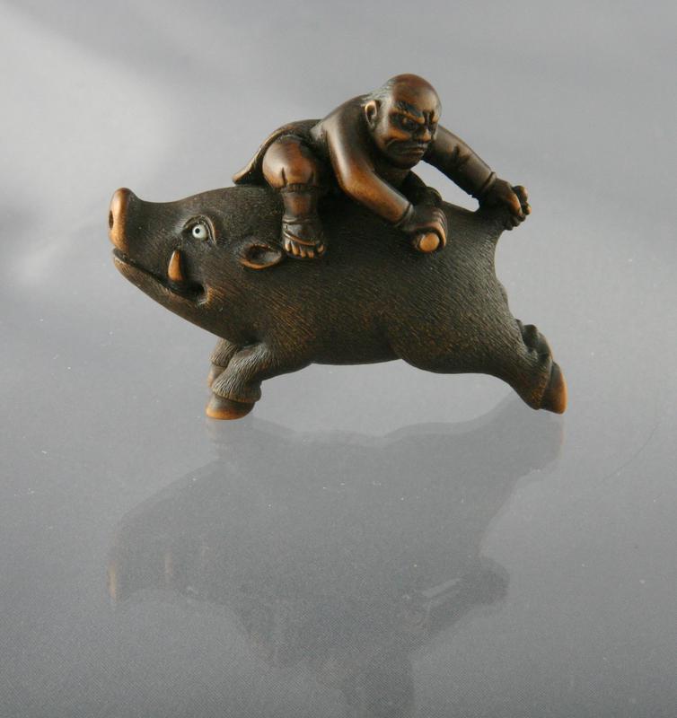 Netsuke of the Warrior Nitta Shiro Killing a Wild Boar