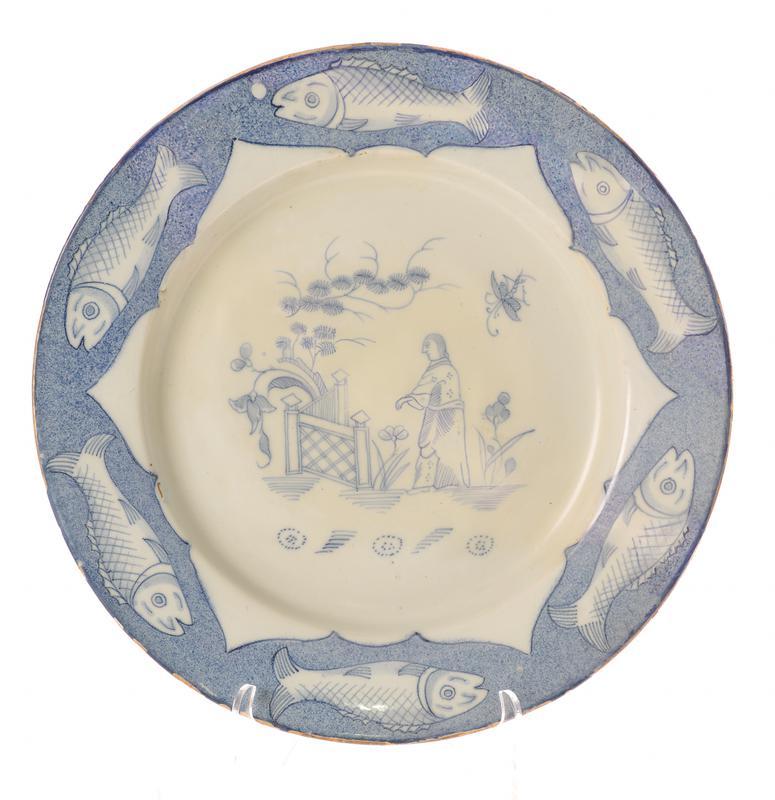 Dish with figure in landscape