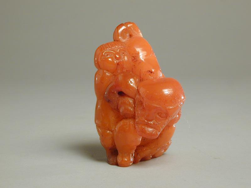 Amber Figurine of Man, Son, & Donkey