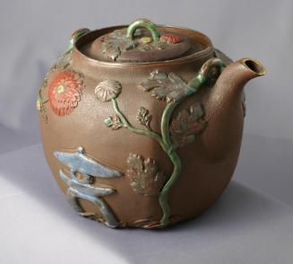 Teapot with Raised Relief Flowers and Lantern