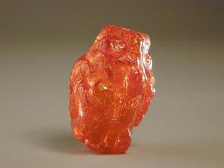 Amber Carving of Three Boys with Lotus Stems