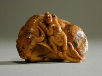 Amber Carving of a Man on a Water Buffalo