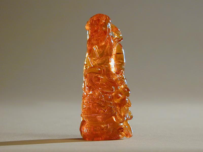 Amber Carving of Female Immortal with Flower Basket