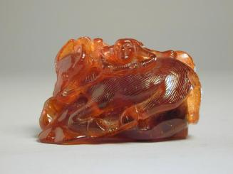 Amber Carving of a Boy on a Water Buffalo