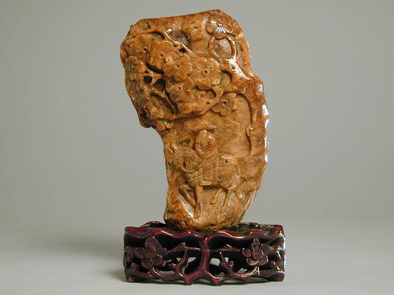 Root Amber Vase of a Figure astride a Horse