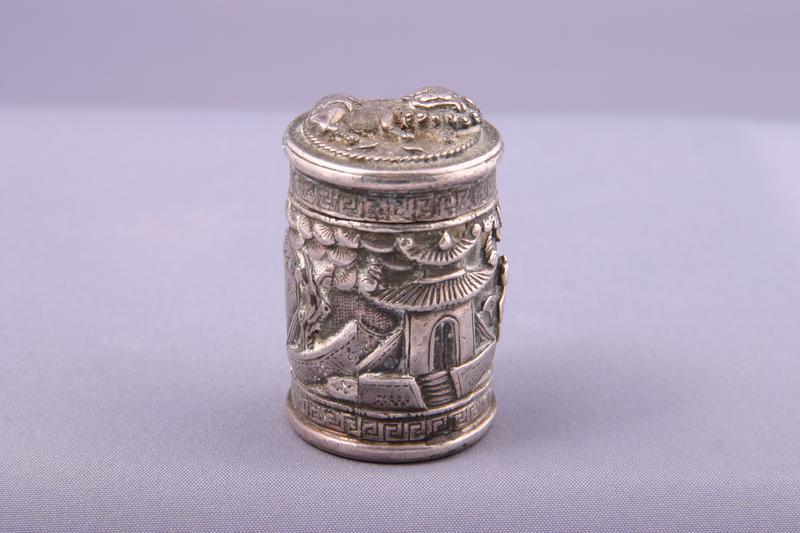 Silver Opium Box with Relief Decoration of a Lion Dog and Figures in a Garden