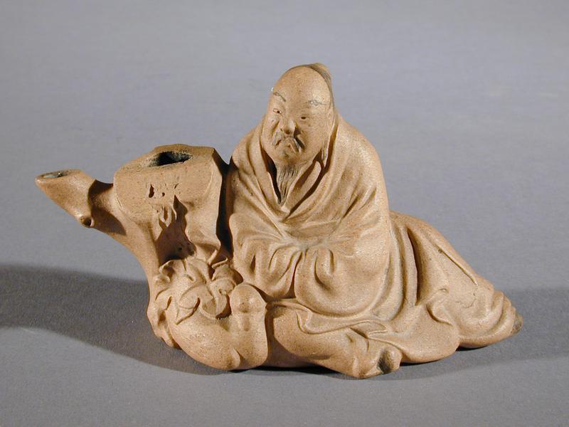 Waterdropper in the shape of a scholar with a duck