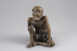 Shiwan Figure of a Seated Man