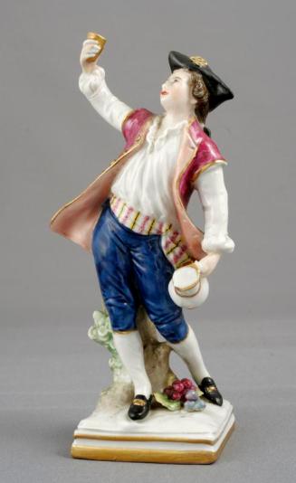 Porcelain Figurine of a Man with a Jug and a Wine Goblet