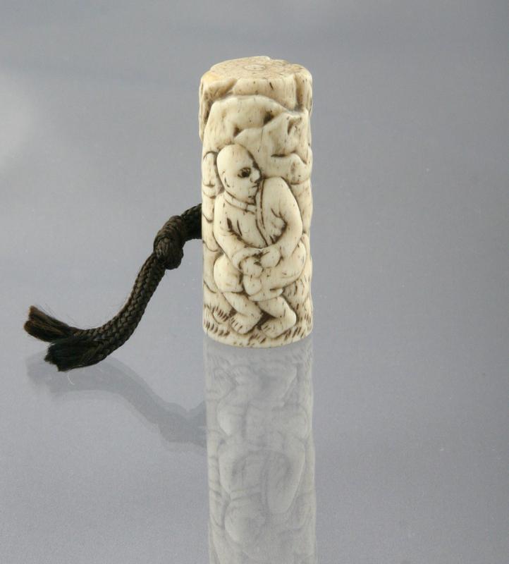 Netsuke of a Man among Rocks and Trees