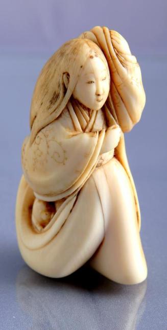 Netsuke: Ivory Figure of a Court Lady in a Kimono