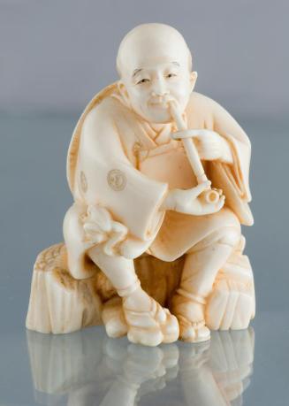 Figurine of a Man with a Pipe