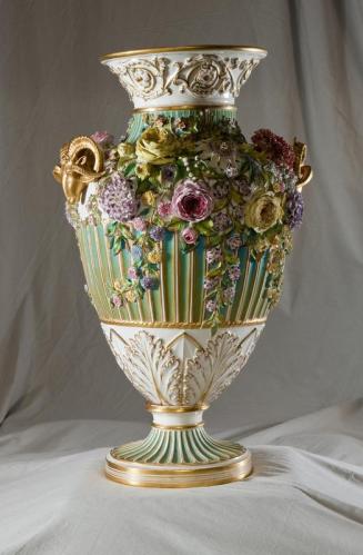 One of a pair of Large Ornate Porcelain Vases