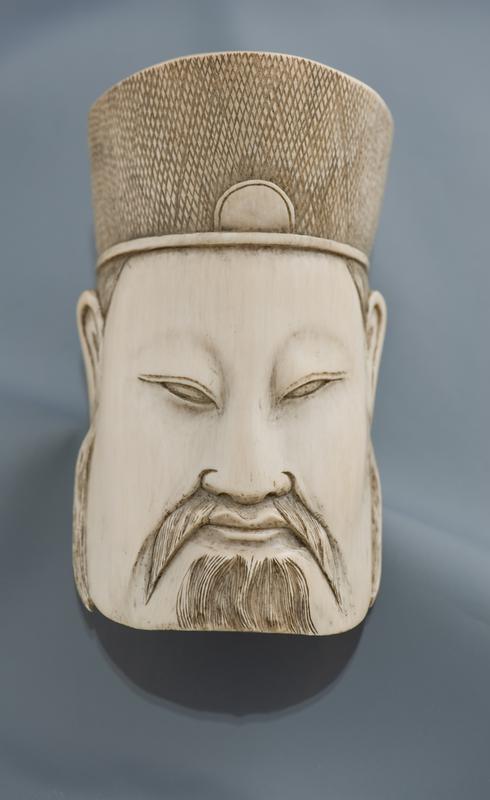 Tea Scoop in the form of an Official's Head