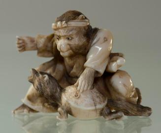 Netsuke of a Monkey with a Badger