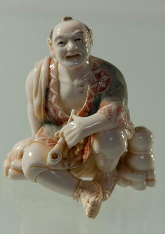 Figurine of a Man with a Pipe
