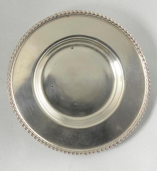 One of a pair of Silver Plated Coasters
