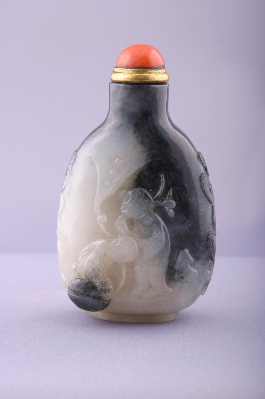 Black and White Jade Snuff Bottle with design of two boys with a dragon