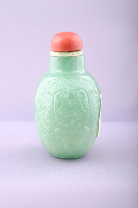 Carved Jadeite Snuff Bottle with Lion Head Design