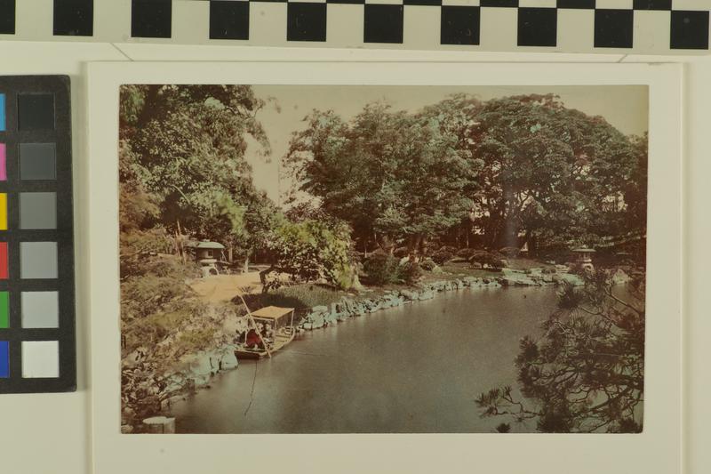 Untitled (Boat in a river by a park)