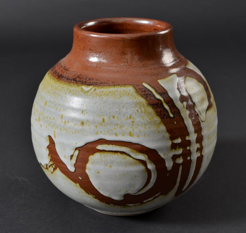 Large round brown/white stoneware vase