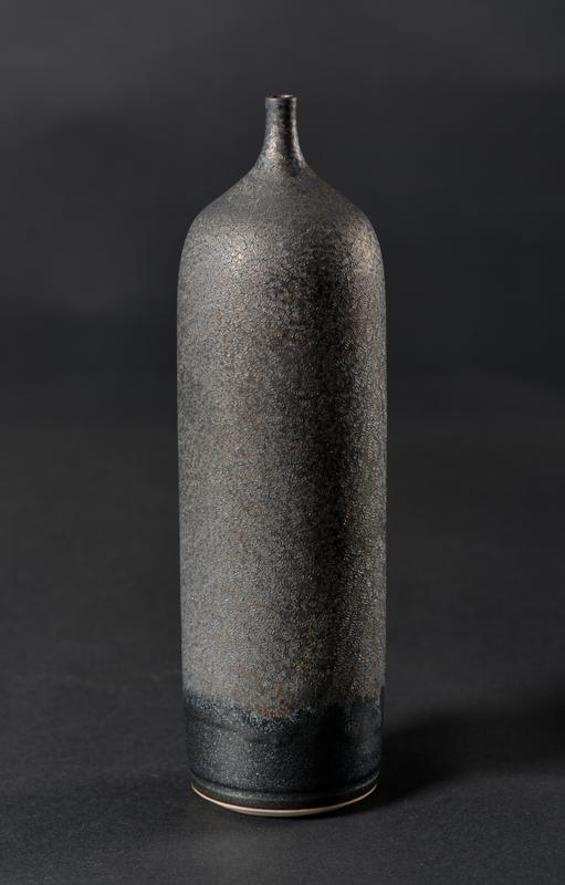 Tall narrow neck bottle