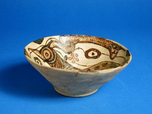 Buff Earthenware Bowl with Stylized Bird and flower Motif
