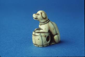 Netsuke with a Dog and a Drum