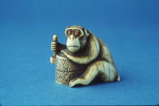 Netsuke depicting a Monkey with a Mallet and a Rice Mill