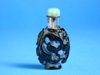Glass Snuff Bottle with black Glass Overlay of an Elongated Dragon