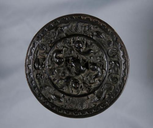 Ornately Decorated Bronze Mirror