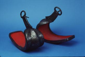 One of a Pair of Metal and Lacquer Stirrups