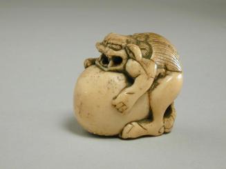 Netsuke depicting a Lion Dog and a Ball