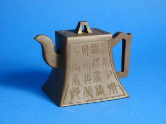 Yixing Teapot with Raised Archaic Style Calligraphy