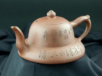 Teapot with Calligraphy Design