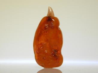 Pebble Form Amber Snuff Bottle with Design of Feline and Bat