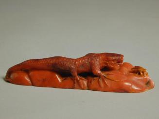 Amber Figurine of a Lizard Chasing a Fly