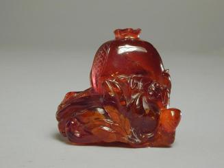 Amber Carving of a Pomegranate and Finger Citrus