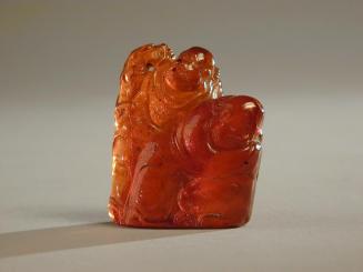 Small Amber Carving of Two Lohan and Lion